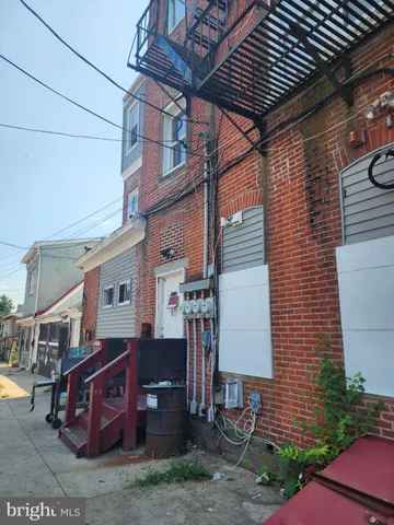 a view of a room with brick walls
