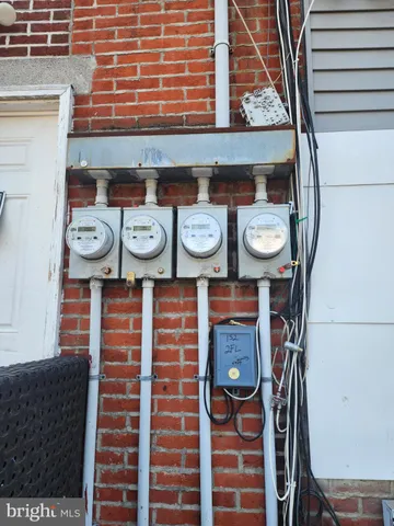 a view of a dinning room with table and chairs