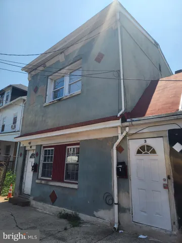 a view of a building with a garage