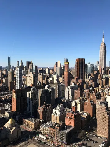 a picture of a bench in a bathroom