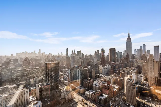 a view of a bathroom with bathtub