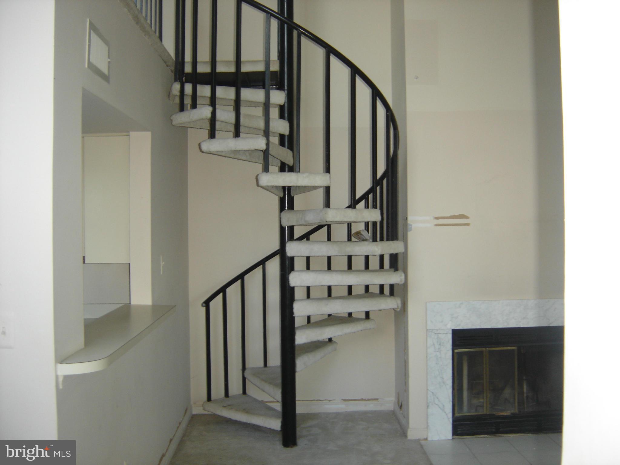 10421 Beacon Ridge Drive, Unit 303 Bowie, MD 20721 - Photo 14 of 25 Spiral Staircase to Loft