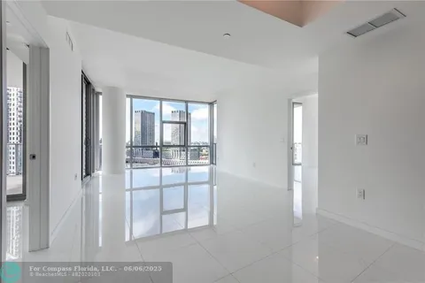 a large bathroom with a large tub and shower