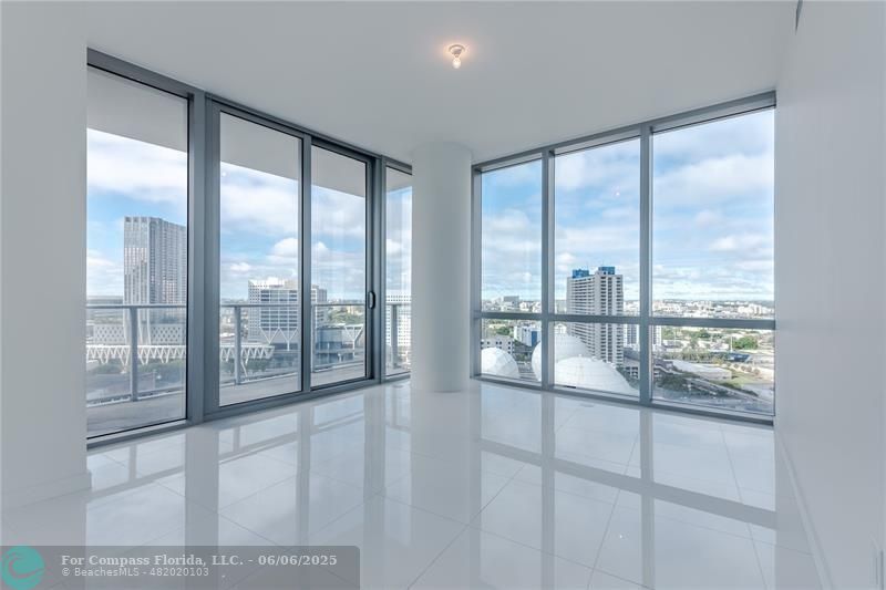 851 Northeast 1st Avenue, Unit 1912 Miami, FL 33132 - Photo 7 of 26 a view of an empty room and window