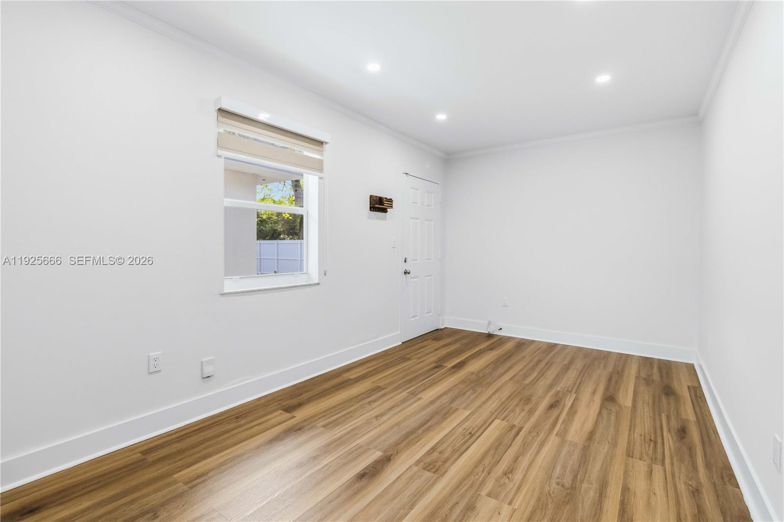 3240 Southwest 69th Avenue, Unit 2 Miami, FL 33155 - Photo 12 of 26 a view of empty room with wooden floor