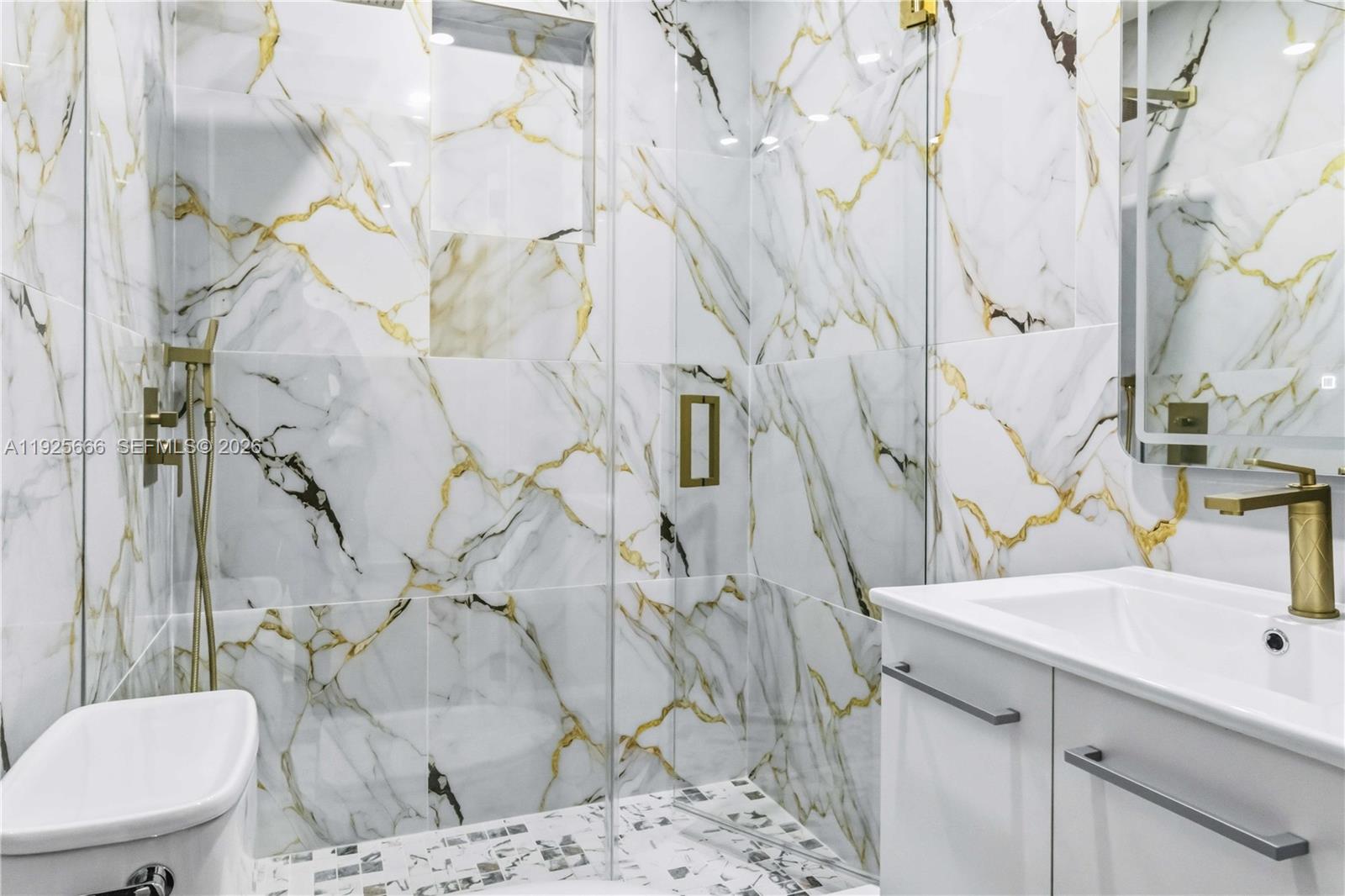 3240 Southwest 69th Avenue, Unit 2 Miami, FL 33155 - Photo 6 of 26 a bathroom with a sink and toilet