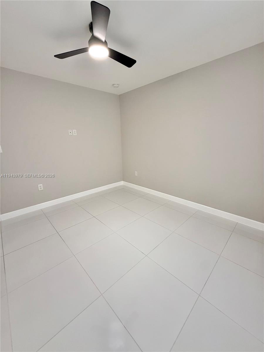 20530 Southwest 316th Street, Unit A Homestead, FL 33030 - Photo 6 of 7 a view of an empty room