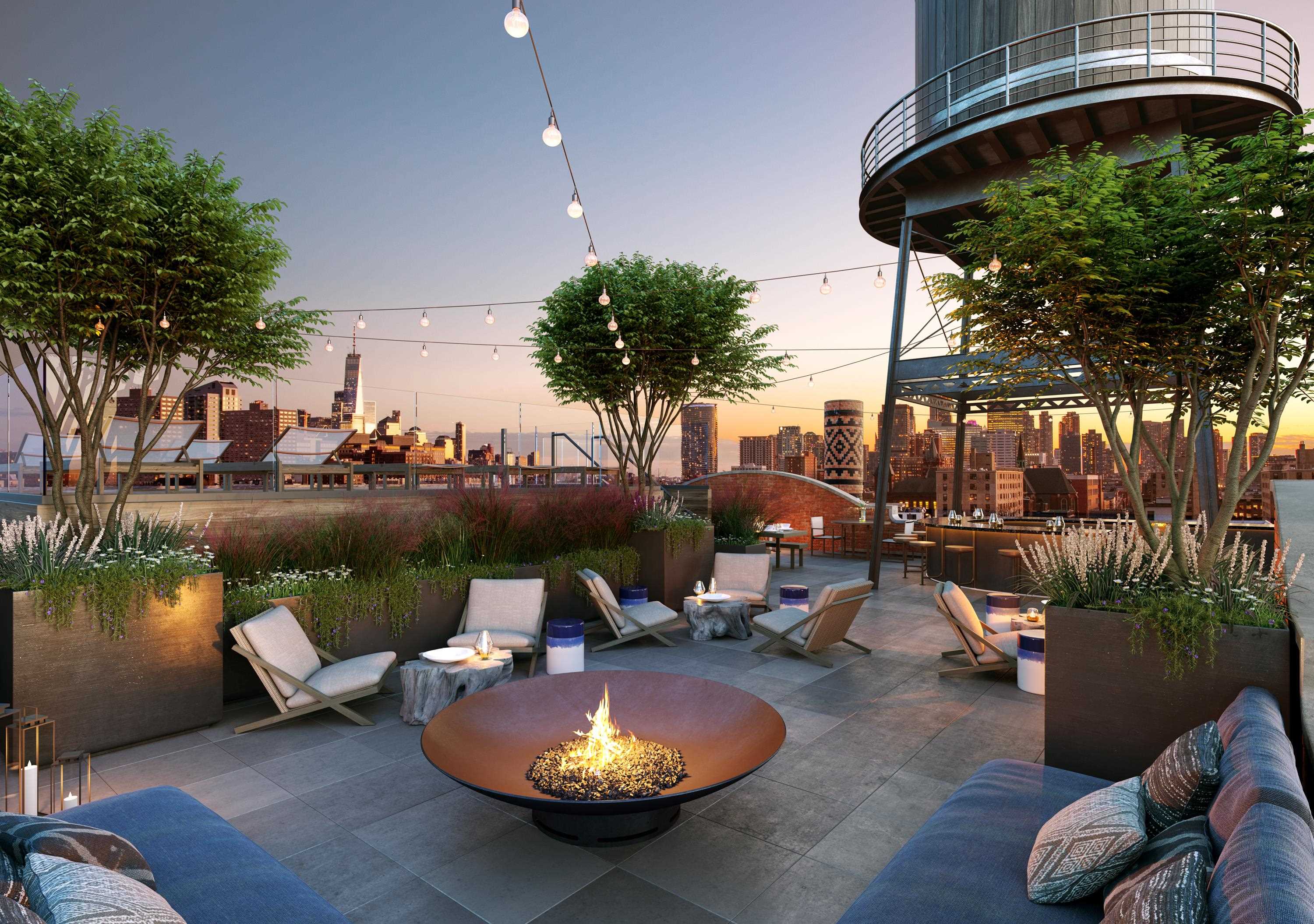 720 Clinton Street, Unit 601 Hoboken, NJ 07030 - Photo 13 of 24 a swimming pool with outdoor seating and plants