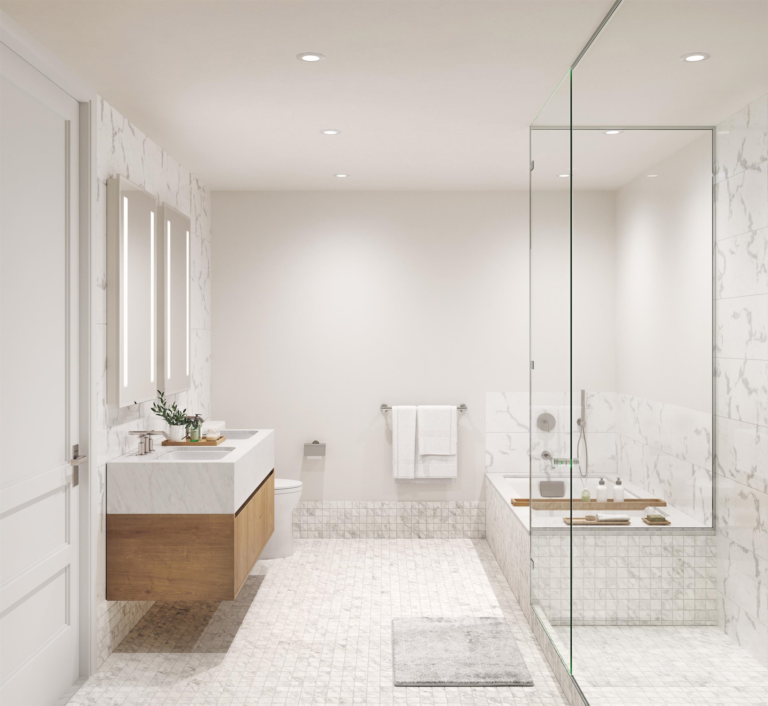 720 Clinton Street, Unit 601 Hoboken, NJ 07030 - Photo 8 of 24 a bathroom with a sink mirror and tub