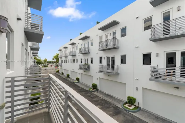 a white bath tub sitting next to a window