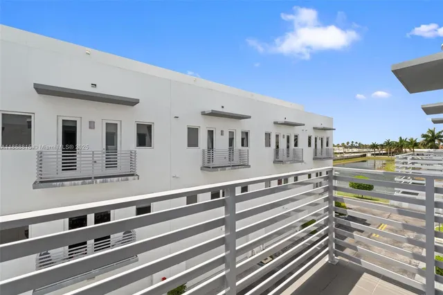 a view of a city with an ocean view