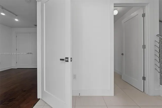 a view of an entryway with hallway