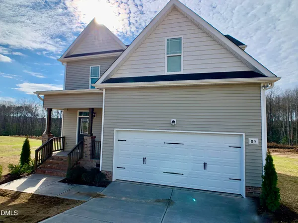a view of a house with a garage