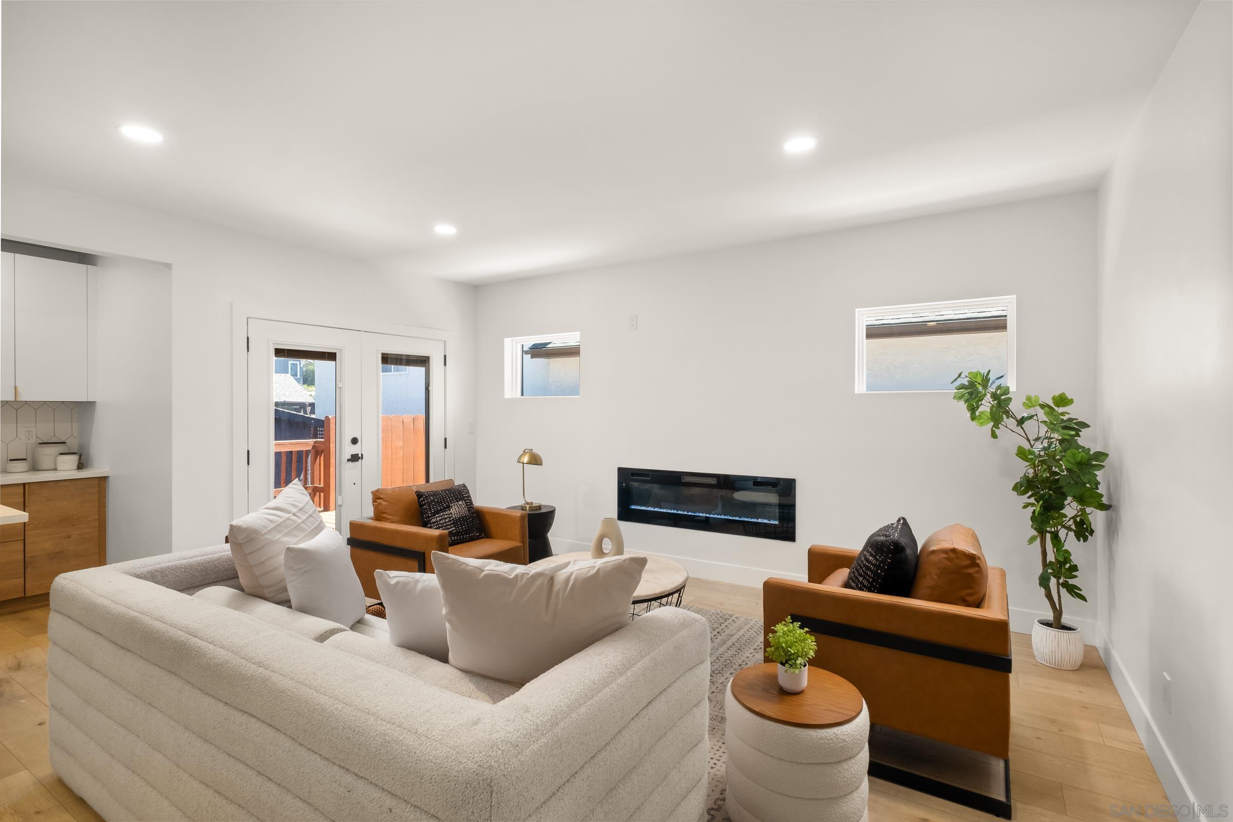 3365 Grim Avenue San Diego, CA 92104 - Photo 12 of 47 a living room with furniture and a potted plant