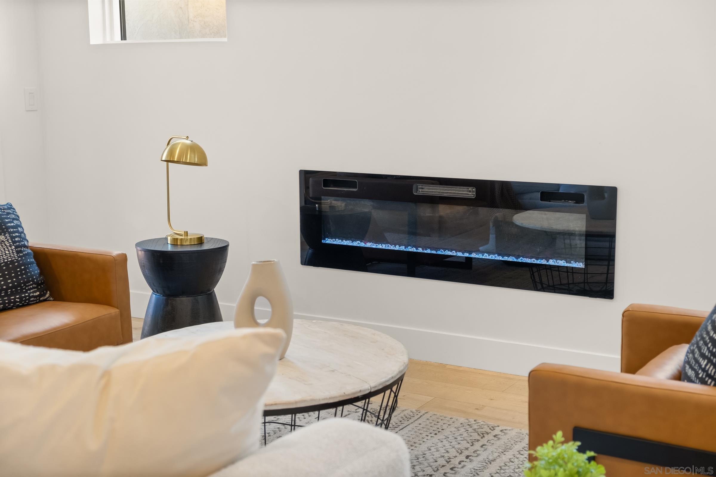 3365 Grim Avenue San Diego, CA 92104 - Photo 13 of 47 a living room with furniture and a potted plant