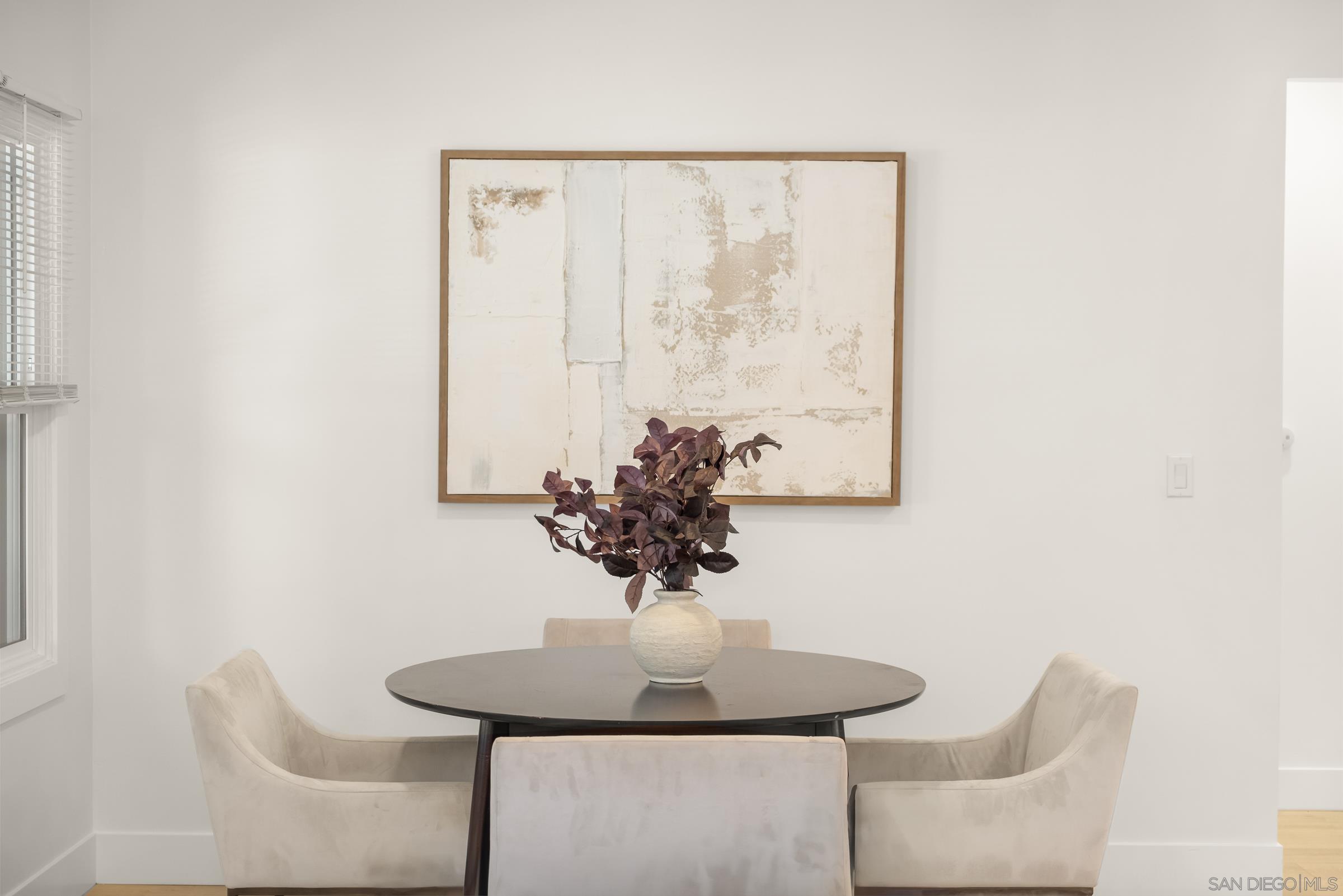 3365 Grim Avenue San Diego, CA 92104 - Photo 17 of 47 a view of a dining room with furniture and a potted plant