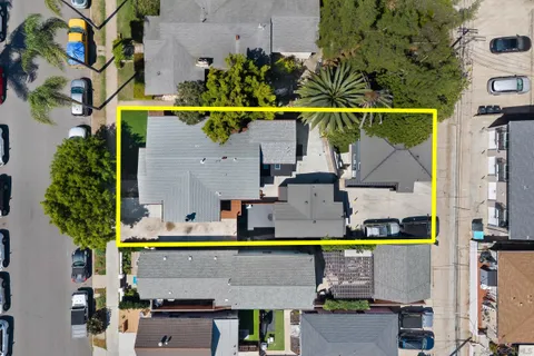 an aerial view of a house with swimming pool