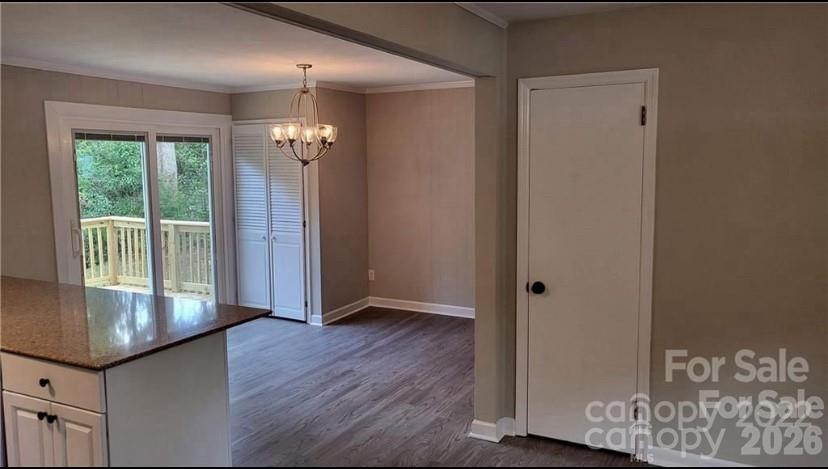 209 Azalea Road Lancaster, SC 29720 - Photo 3 of 4 wooden floor in an empty room with a window