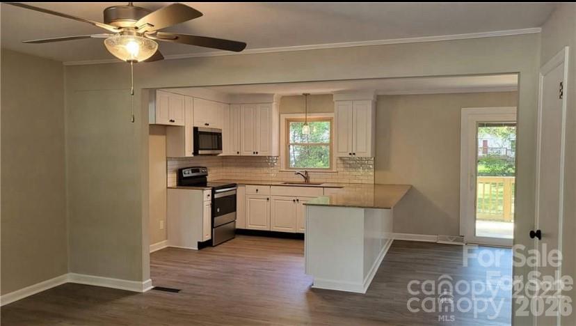 209 Azalea Road Lancaster, SC 29720 - Photo 4 of 4 a kitchen with a sink cabinets and window