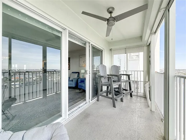 a kitchen with stainless steel appliances granite countertop a stove a sink a dining table and chairs