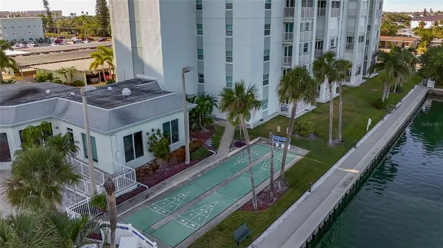 an aerial view of a city with ocean view
