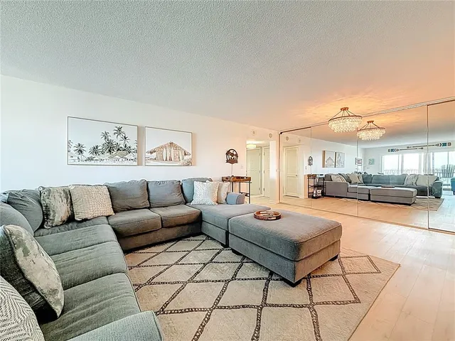 a living room with a couch and a table