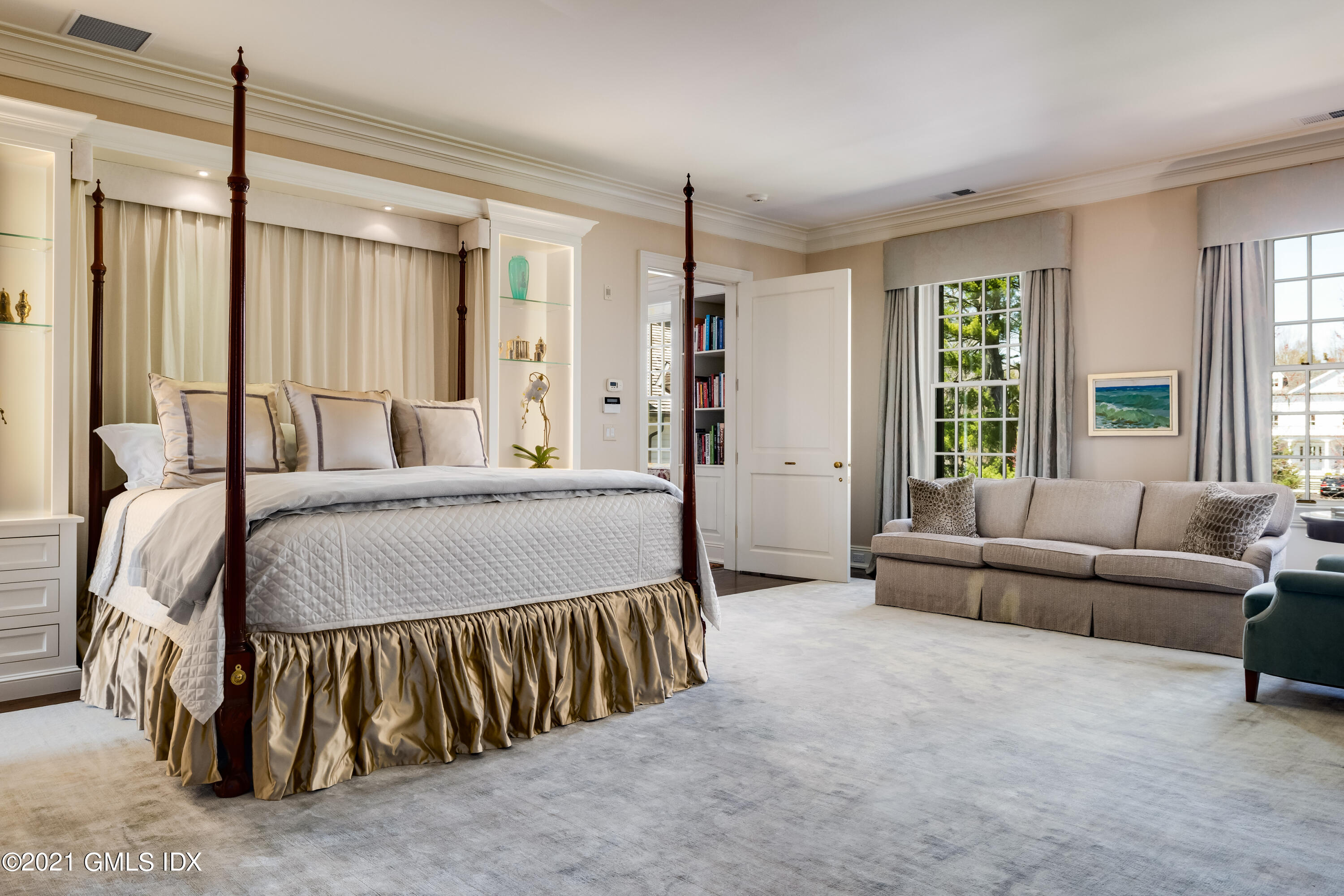 94 Doubling Road Greenwich, CT 06830 - Photo 14 of 26 a spacious bedroom with a bed and a couch