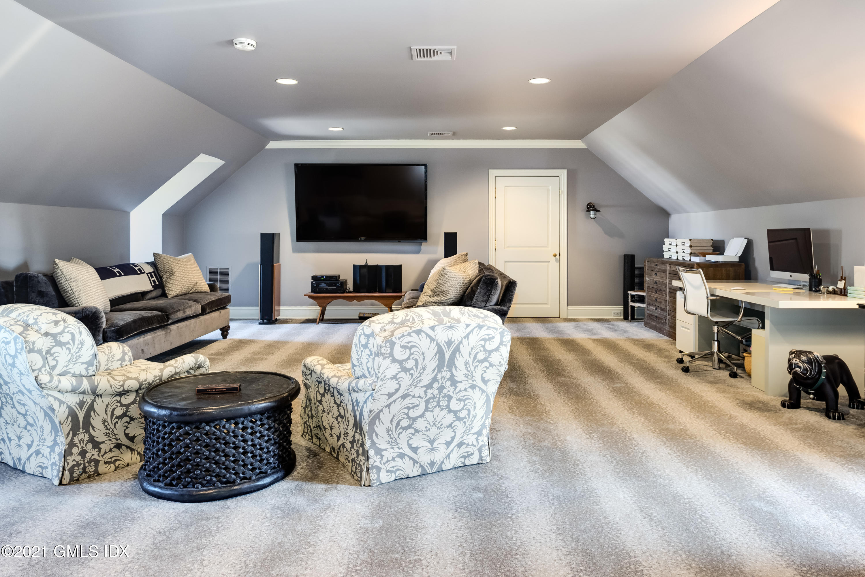 94 Doubling Road Greenwich, CT 06830 - Photo 20 of 26 a living room with furniture and a flat screen tv