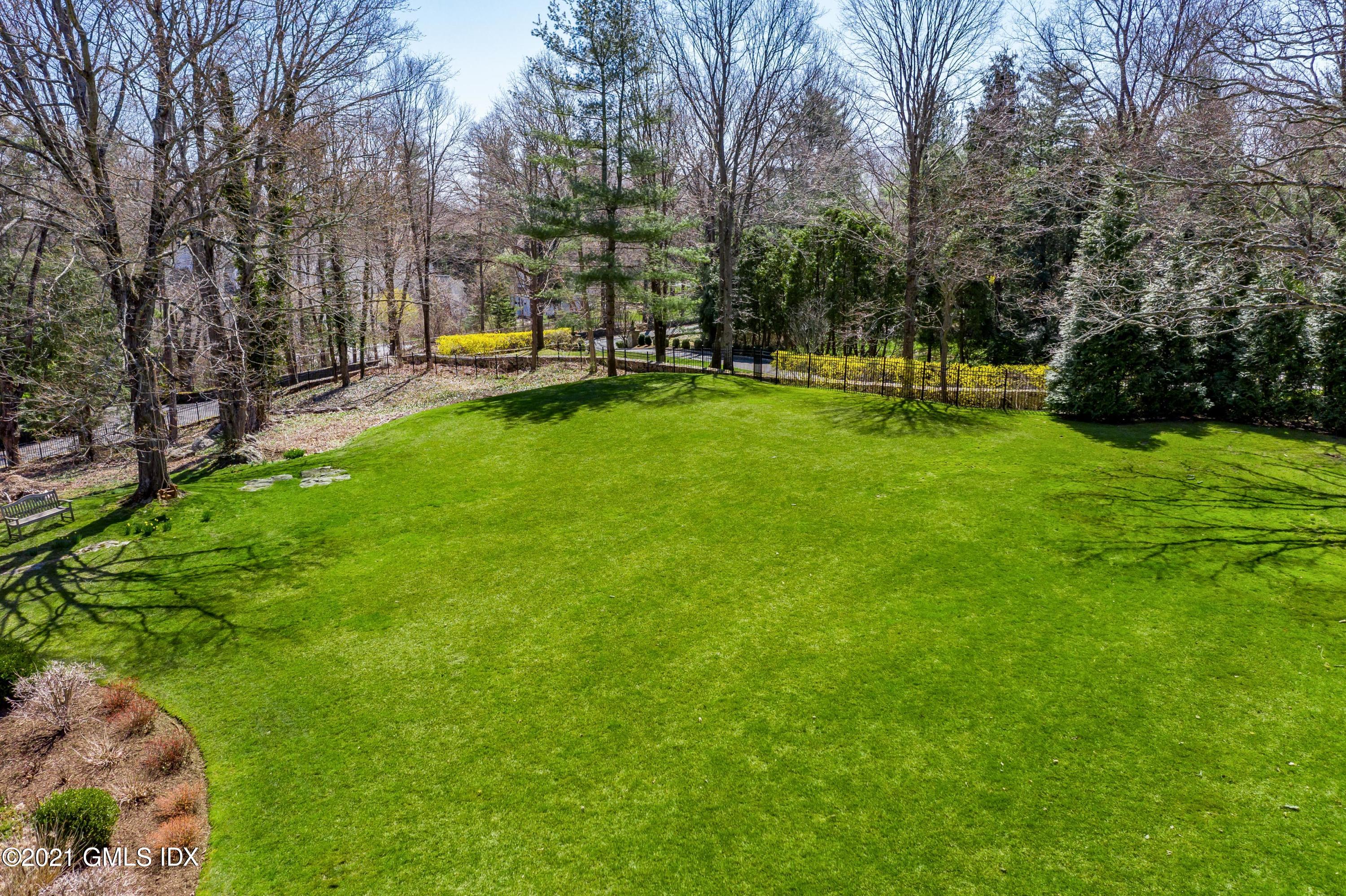 94 Doubling Road Greenwich, CT 06830 - Photo 22 of 26 a view of a park with large trees