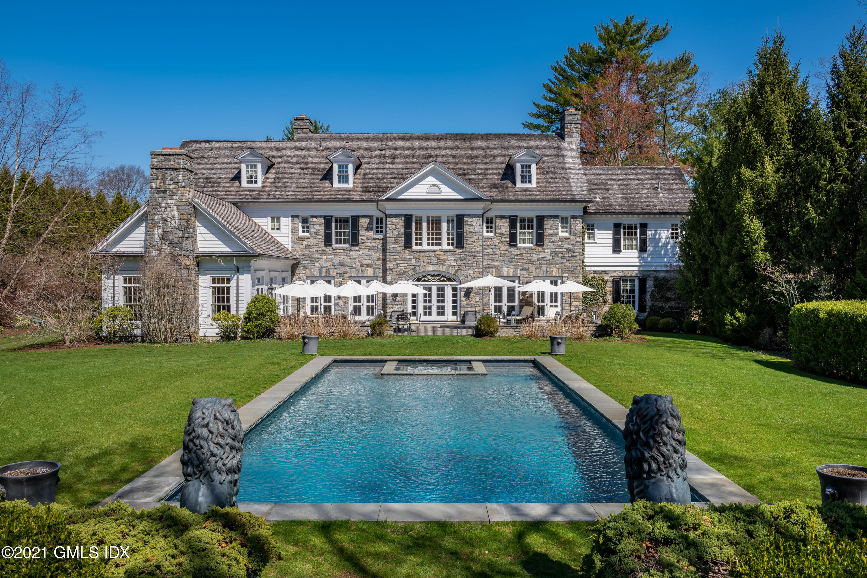 94 Doubling Road Greenwich, CT 06830 - Photo 24 of 26 a view of a house with a big yard