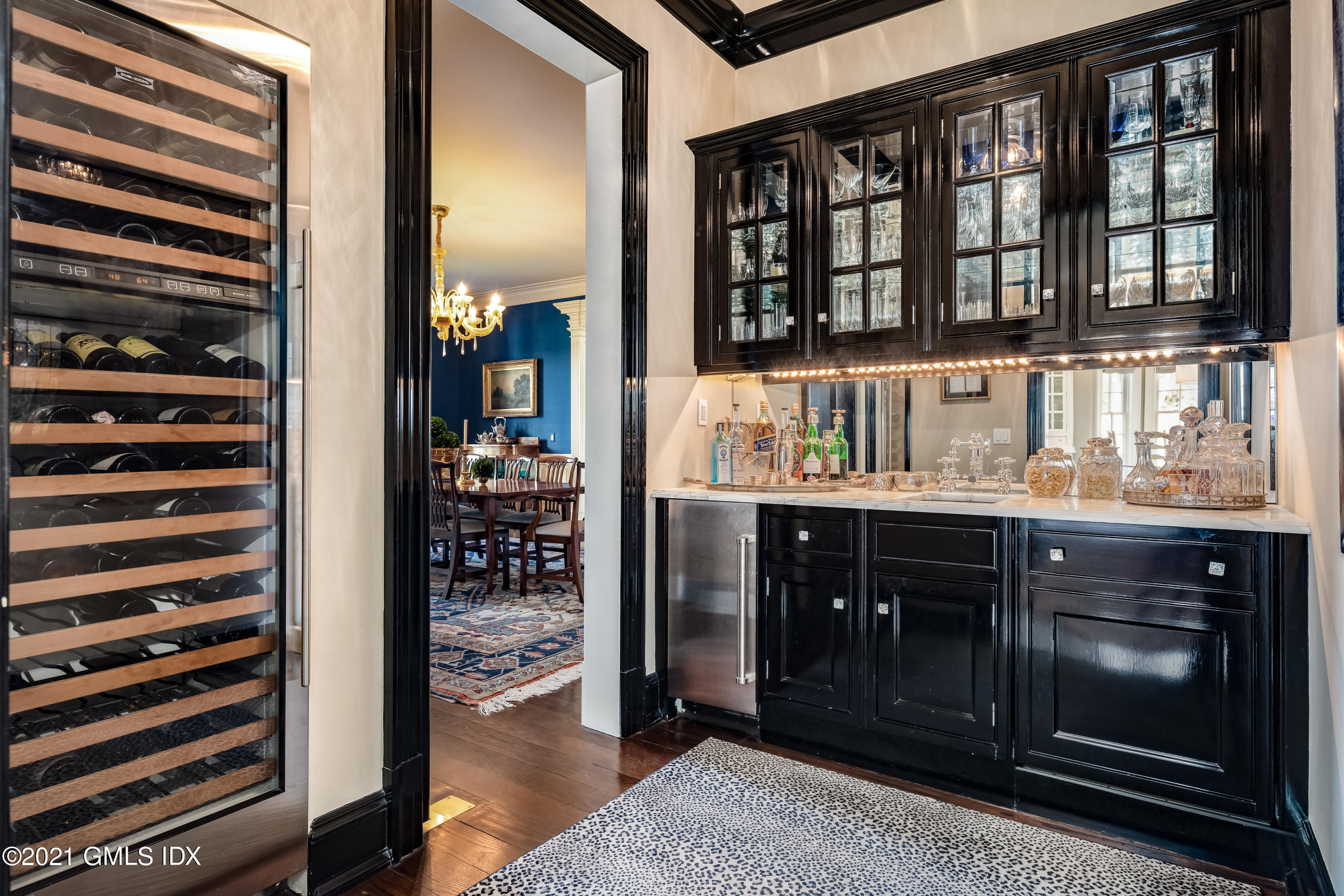 94 Doubling Road Greenwich, CT 06830 - Photo 9 of 26 a kitchen area with granite countertop a refrigerator and a sink