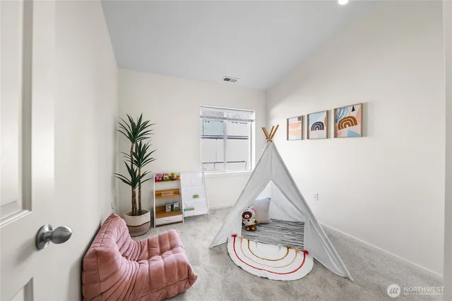 a room with furniture and a wooden floor