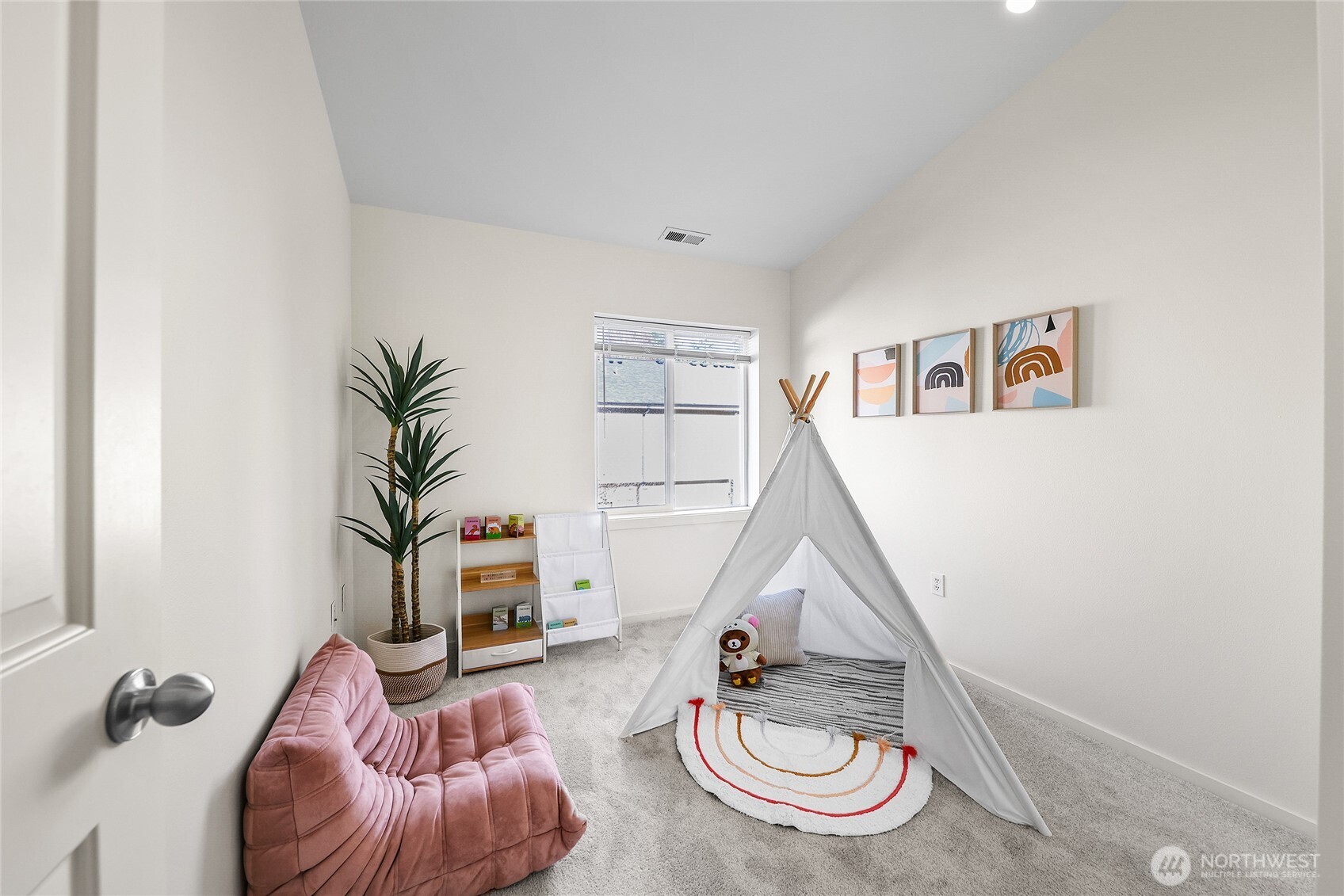 18258 Northeast 96th Way, Unit 101 Redmond, WA 98052 - Photo 20 of 36 a room with furniture and a wooden floor