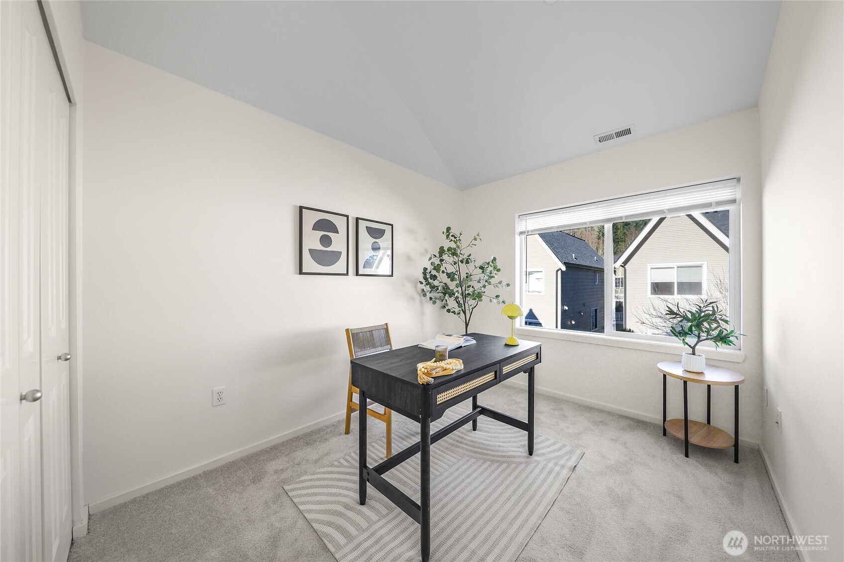 18258 Northeast 96th Way, Unit 101 Redmond, WA 98052 - Photo 21 of 36 a workspace with furniture and a window