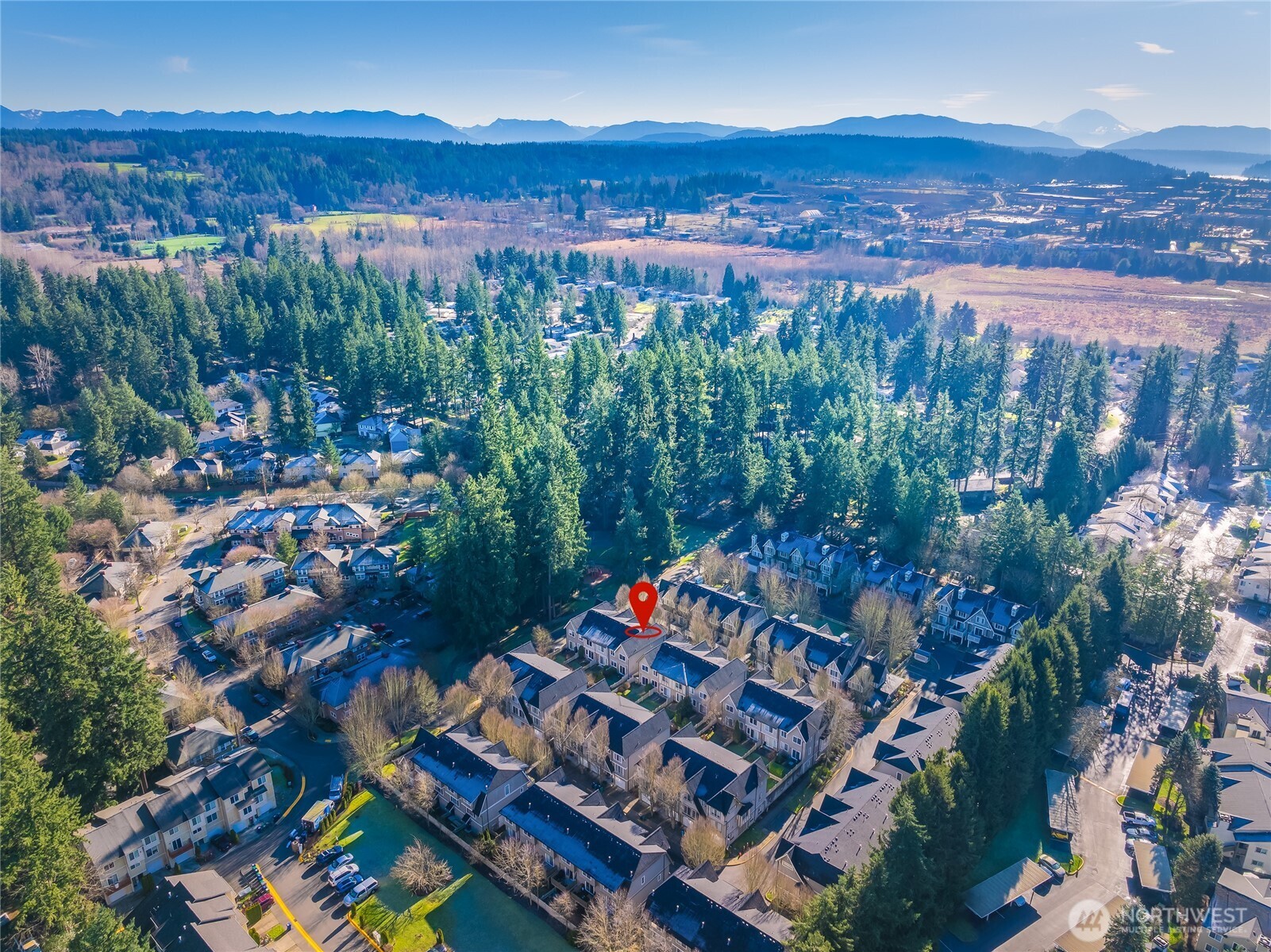 18258 Northeast 96th Way, Unit 101 Redmond, WA 98052 - Photo 32 of 36 an outdoor space view with a lake view
