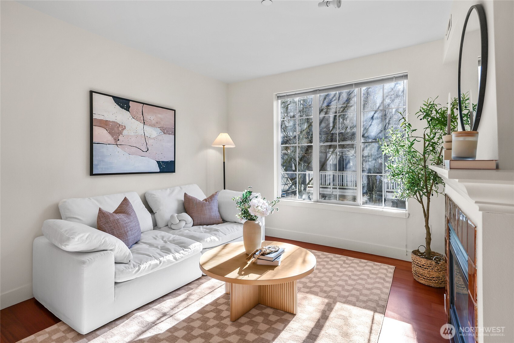 18258 Northeast 96th Way, Unit 101 Redmond, WA 98052 - Photo 5 of 36 a living room with furniture and a large window