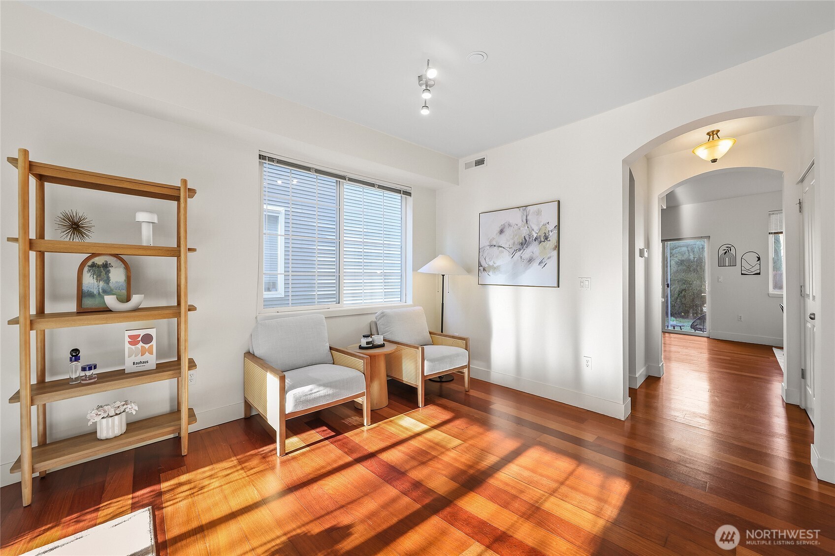 18258 Northeast 96th Way, Unit 101 Redmond, WA 98052 - Photo 7 of 36 a living room with furniture and a window