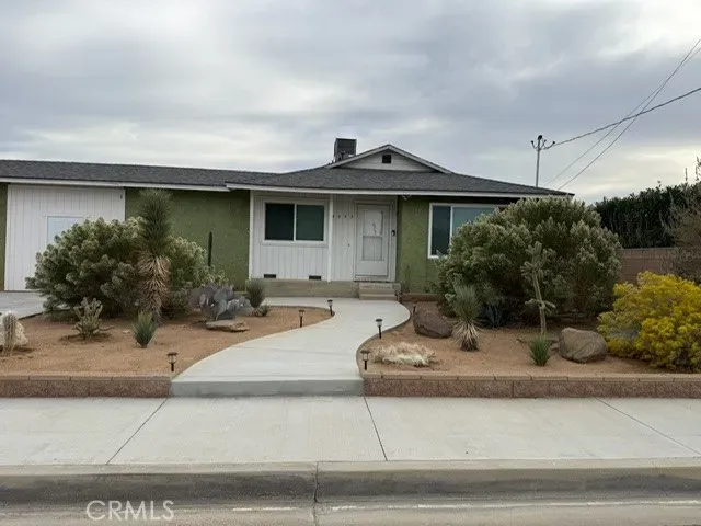 a front view of a house with porch