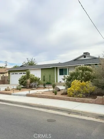 front view of a house with a street