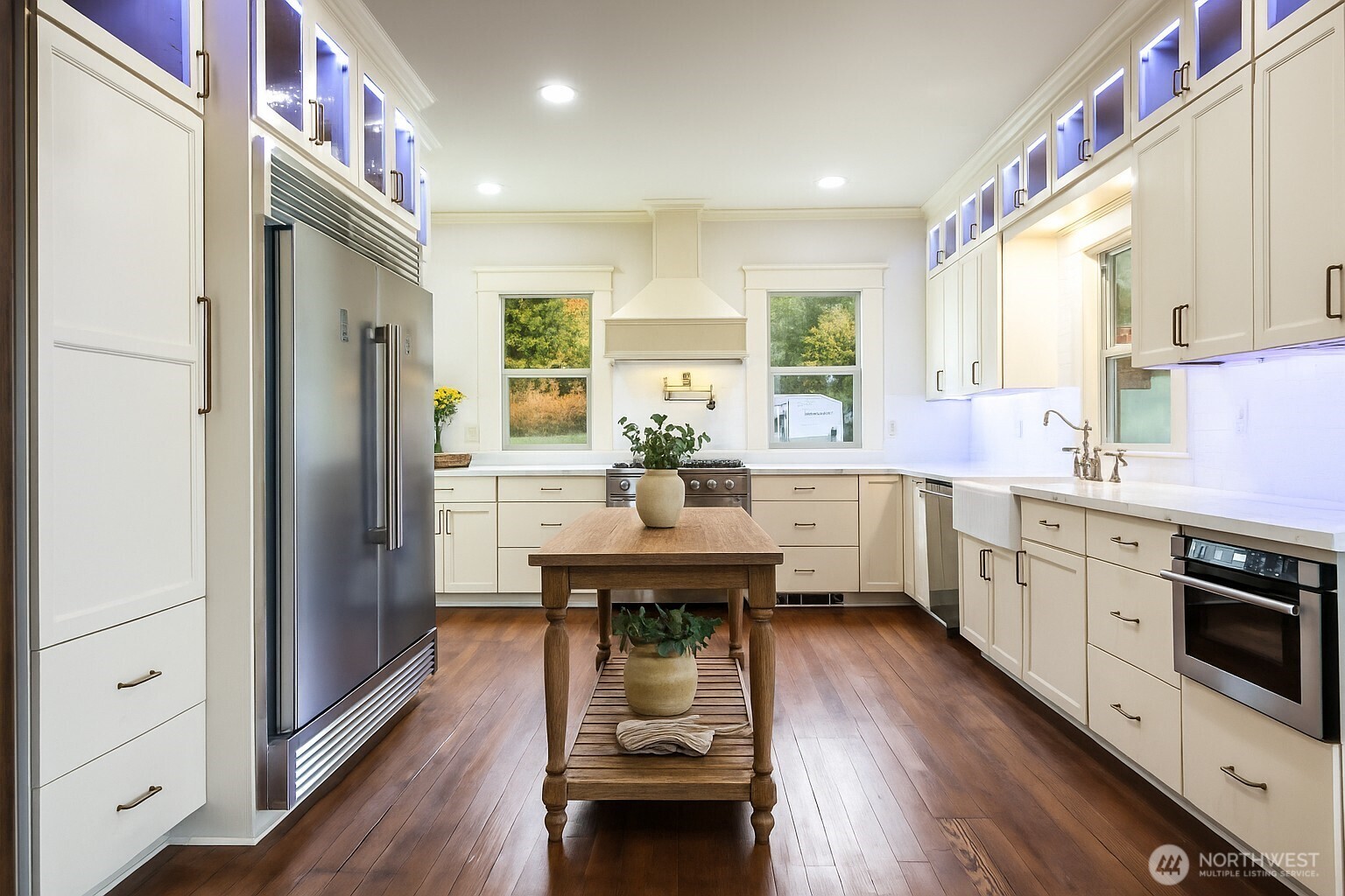 1604 Lincoln Creek Road Rochester, WA 98579 - Photo 17 of 37 a kitchen with stainless steel appliances granite countertop a refrigerator a sink dishwasher a oven with white cabinets and wooden floor