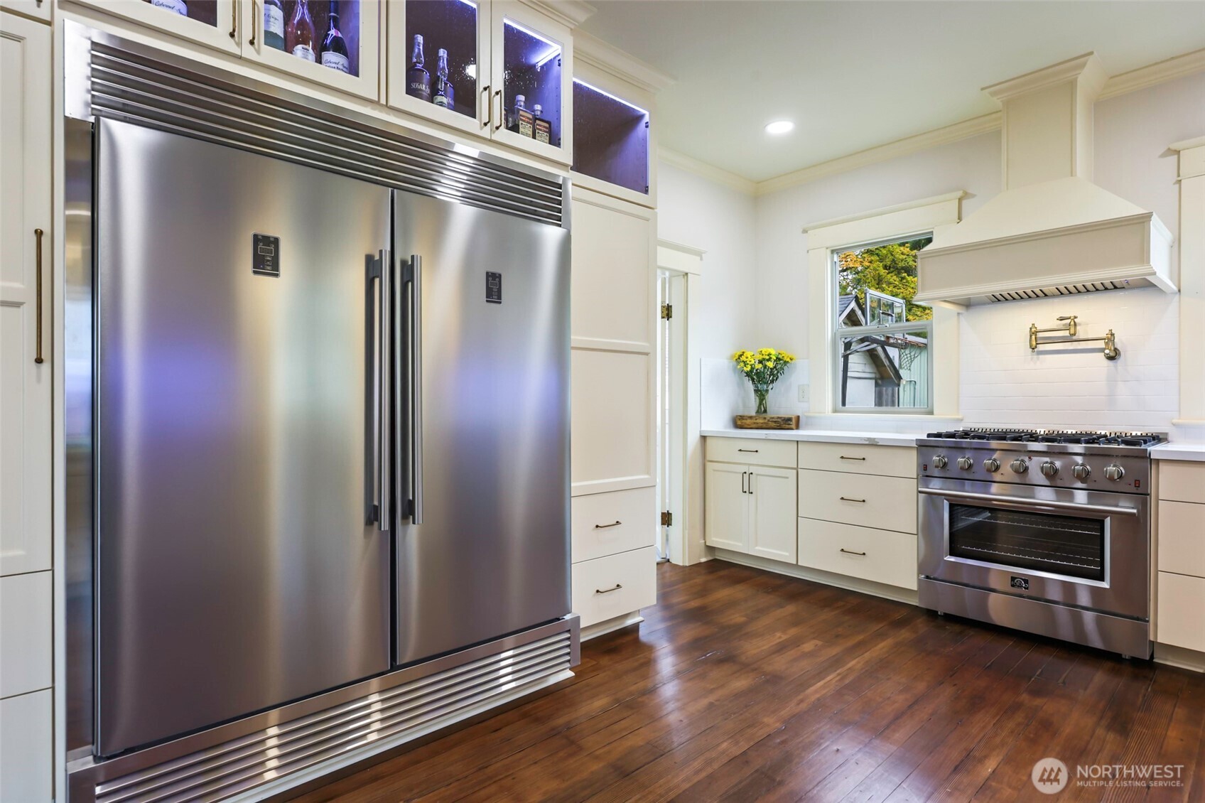 1604 Lincoln Creek Road Rochester, WA 98579 - Photo 20 of 37 a kitchen with stainless steel appliances a refrigerator and a stove