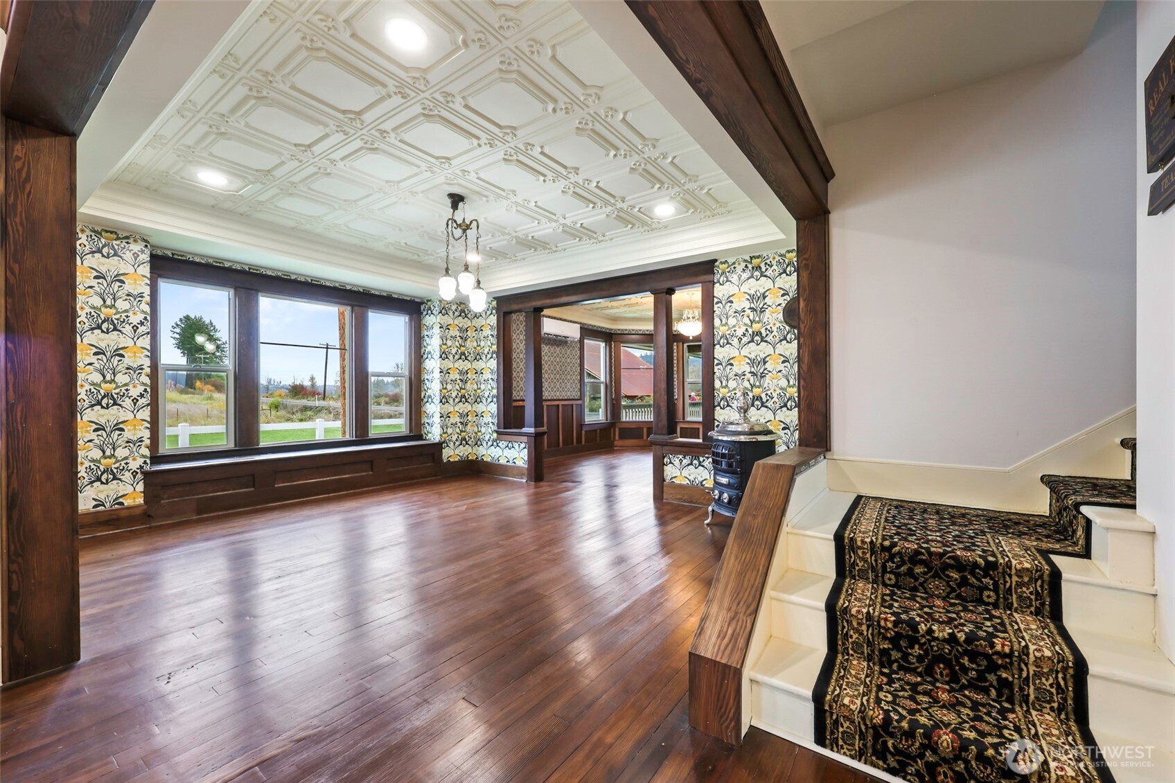 1604 Lincoln Creek Road Rochester, WA 98579 - Photo 22 of 37 a bed room with wooden floor and windows