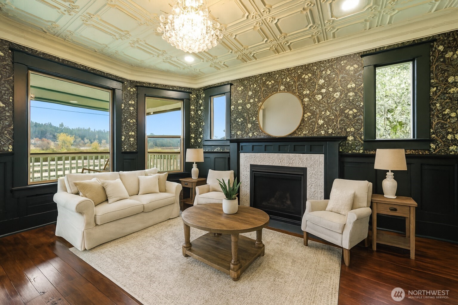1604 Lincoln Creek Road Rochester, WA 98579 - Photo 6 of 37 a living room with furniture a fireplace and a large window