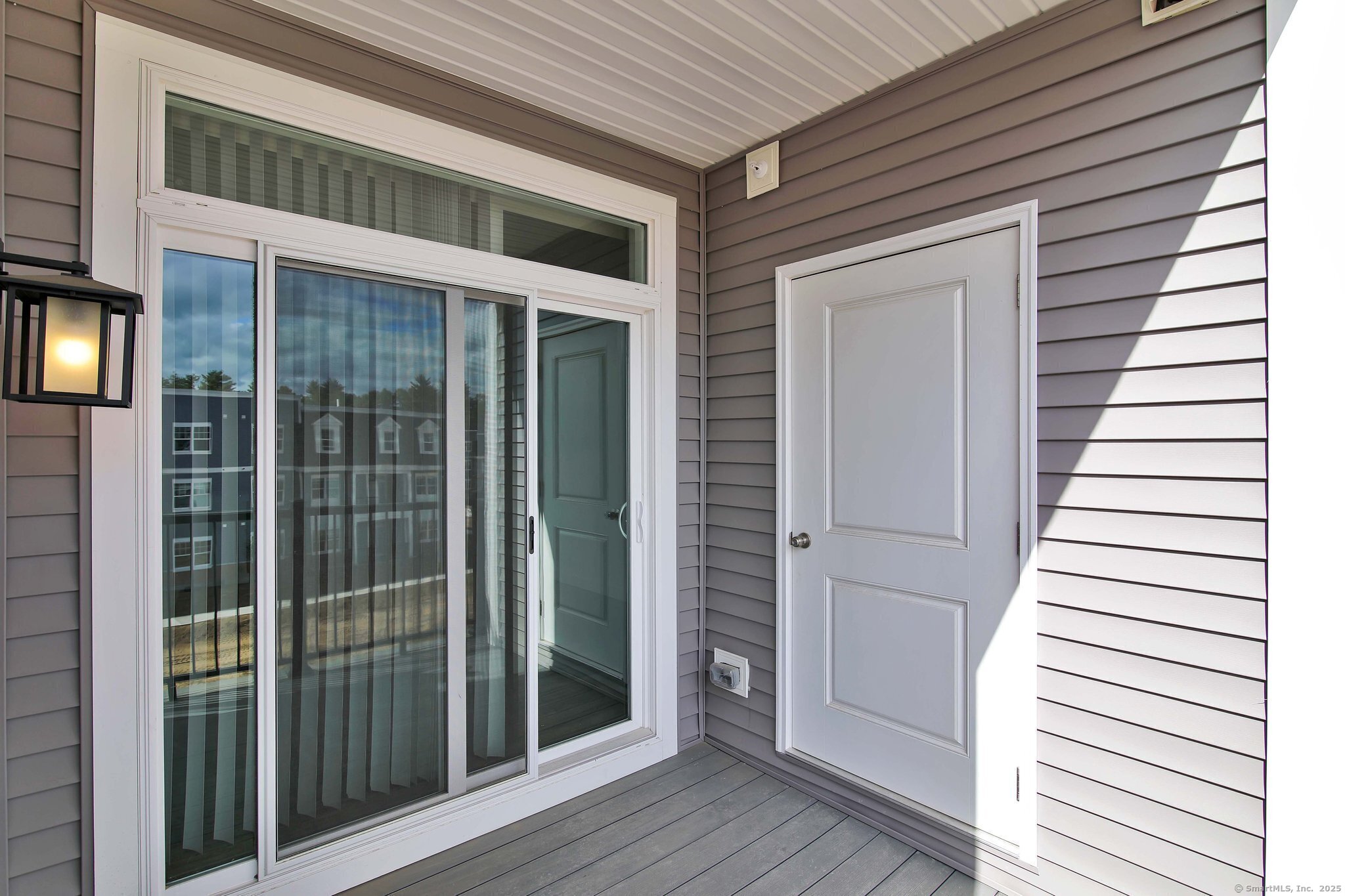 280 Salmon Brook Street, Unit 7107A Granby, CT 06035 - Photo 14 of 26 a view of front door and deck