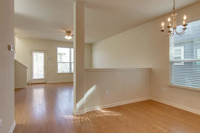 a view of livingroom with window and hardwood floor