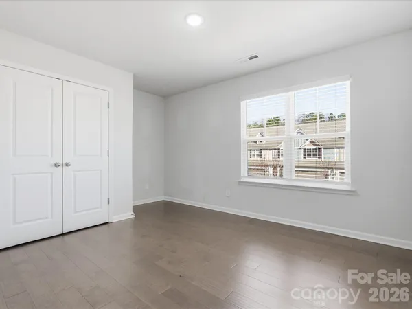 a kitchen that has a lot of fruit on it and cabinets