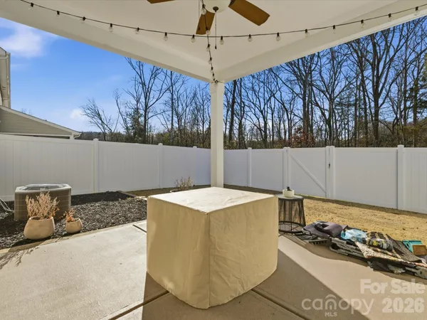 a view of a house with a snow in the yard