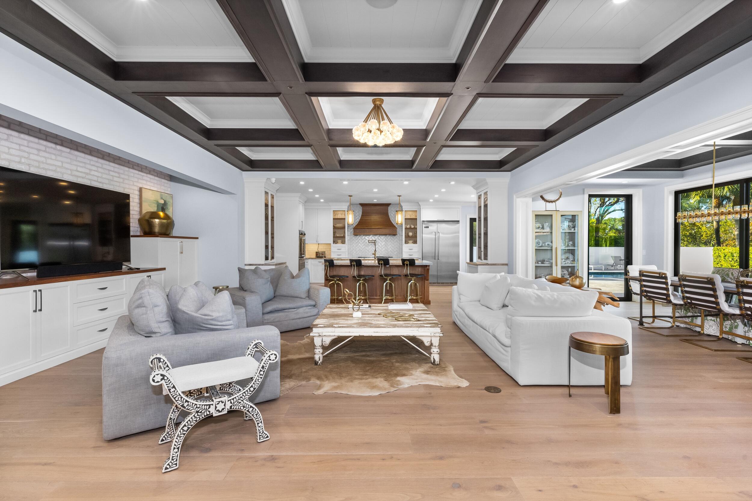 39 Country Road South Boynton Beach, FL 33436 - Photo 13 of 55 a living room with furniture and a flat screen tv