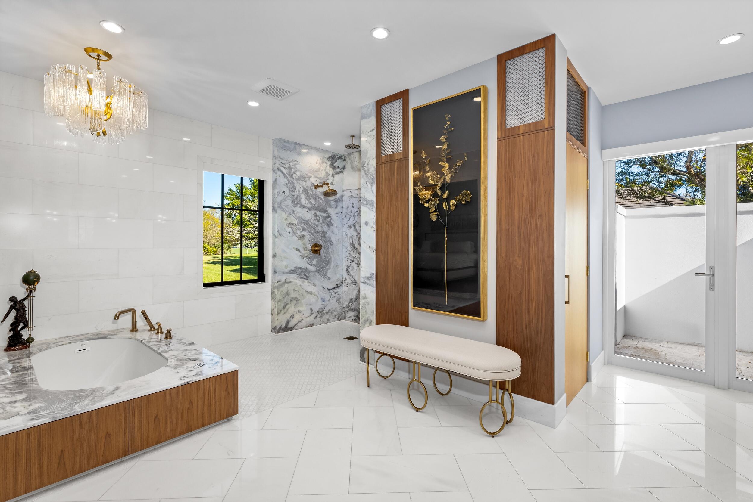 39 Country Road South Boynton Beach, FL 33436 - Photo 31 of 55 a bathroom with a sink and a bathtub