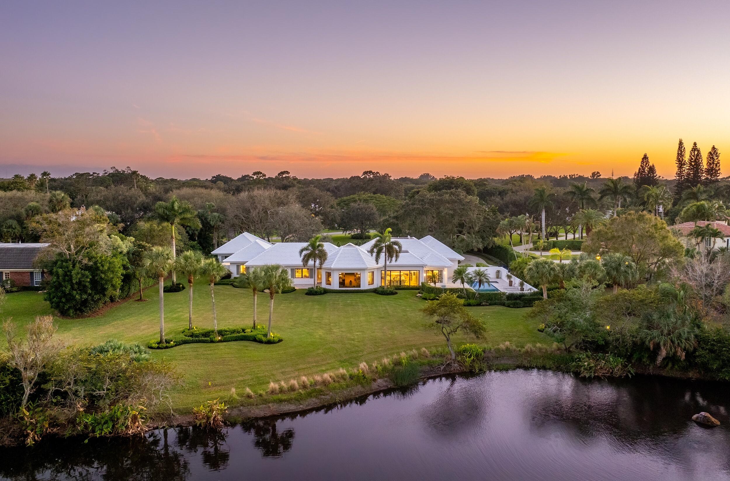 39 Country Road South Boynton Beach, FL 33436 - Photo 51 of 55 an aerial view of residential houses with outdoor space and trees